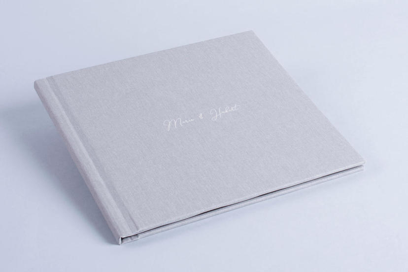 Exclusive photo book with names on the cover white nphoto printing lab for professional photographers